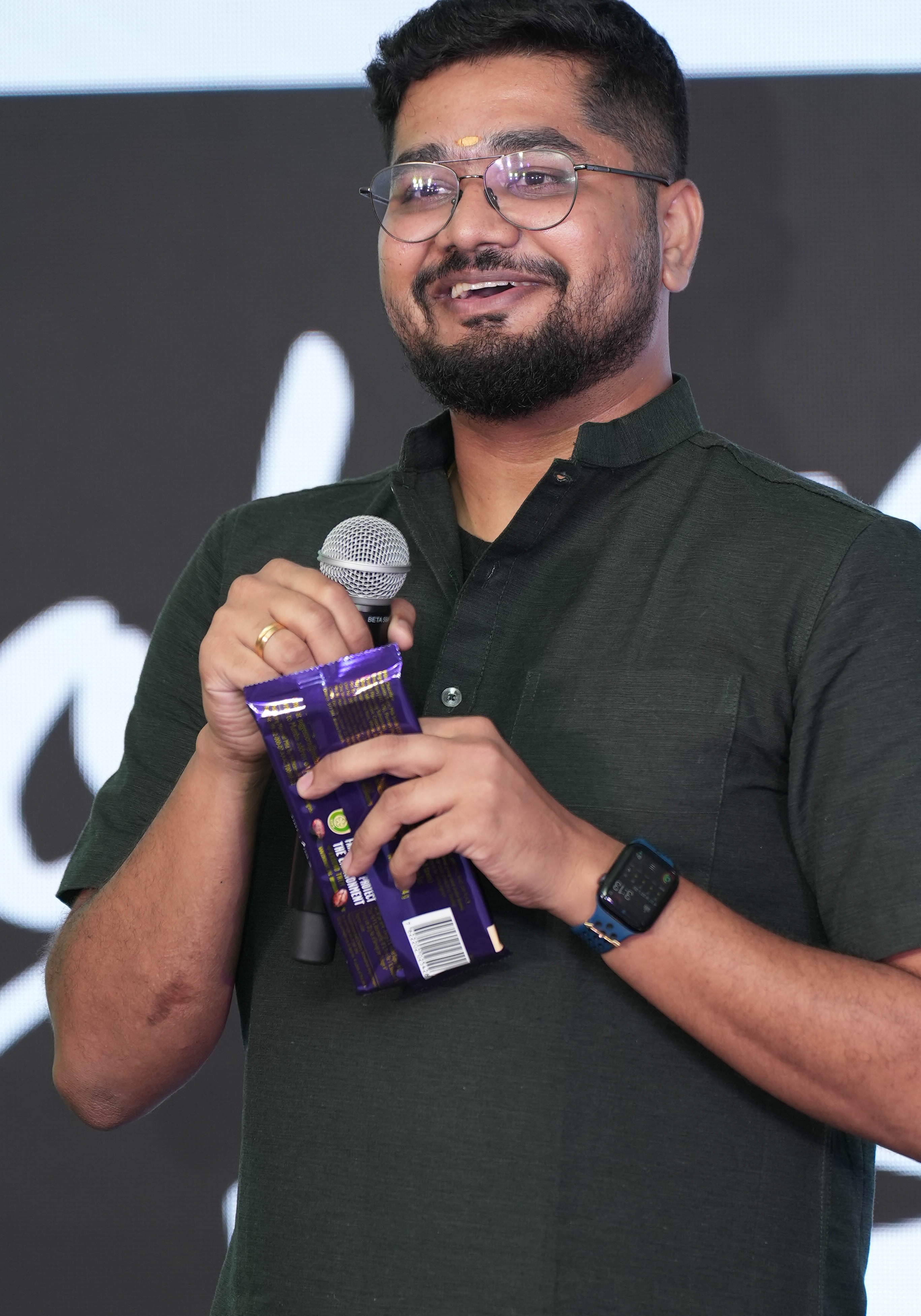 Ashok Hariharan speaking at an event